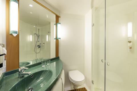 Shower, eco-friendly toiletries, hair dryer, towels