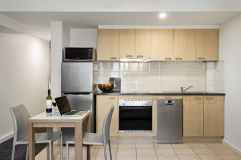 Studio Apartment | Private kitchen | Fridge, microwave, oven, stovetop