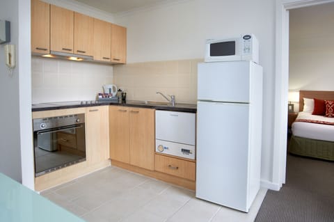 One Bedroom Apartment | Private kitchen | Fridge, microwave, oven, stovetop