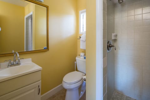 Standard Room, 2 Queen Beds | Bathroom | Shower, hair dryer, towels, soap