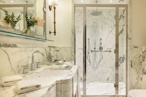 Family Room, 2 Bedrooms | Bathroom | Combined shower/tub, hair dryer, slippers, towels