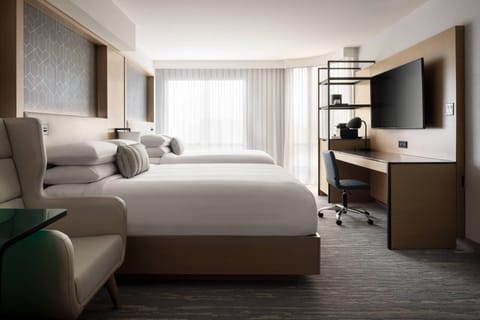 Deluxe Room, 2 Queen Beds, Non Smoking | Premium bedding, down comforters, pillowtop beds, in-room safe