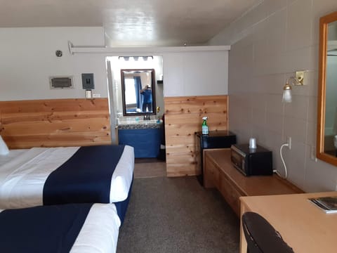 Standard Double Room, 2 Queen Beds | Living area | Flat-screen TV