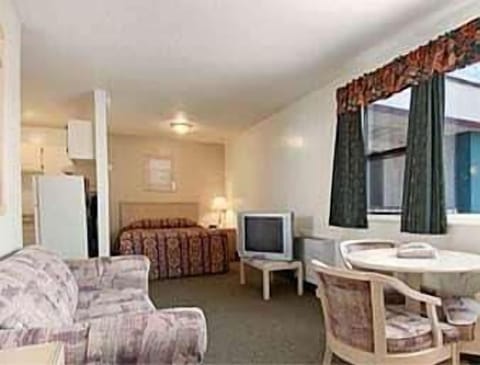 Standard Room, 2 Queen Beds, Kitchenette | Desk, laptop workspace, blackout drapes, iron/ironing board