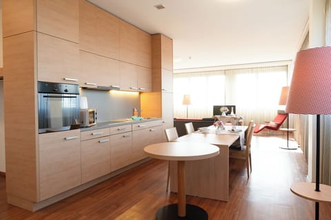 Suite | Living area | Flat-screen TV, pay movies