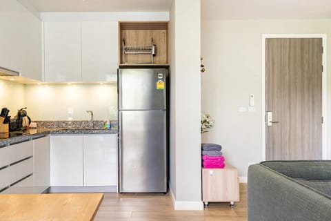 Comfort Apartment | Private kitchen | Full-size fridge, microwave, stovetop, electric kettle