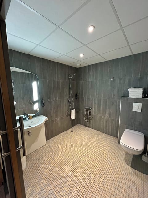 Family Room, 2 Double Beds | Bathroom | Eco-friendly toiletries, hair dryer, bathrobes, towels