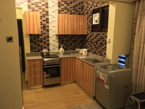 Apartment, 2 Bedrooms | Private kitchen | Full-size fridge, microwave, oven, stovetop