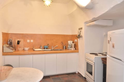 Apartment (Cave) | Private kitchen | Full-size fridge, coffee/tea maker, electric kettle