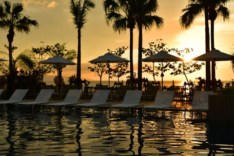 Indoor pool, outdoor pool, open 9:00 AM to 8:00 PM, cabanas (surcharge)