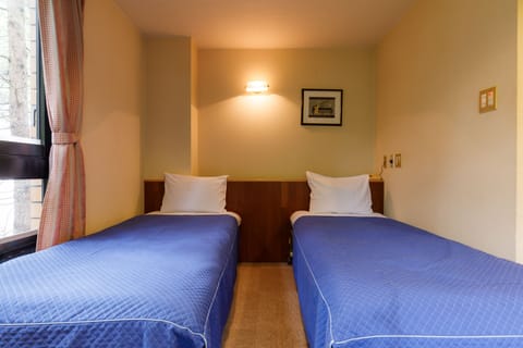 Twin Room, Non Smoking | Free WiFi, bed sheets