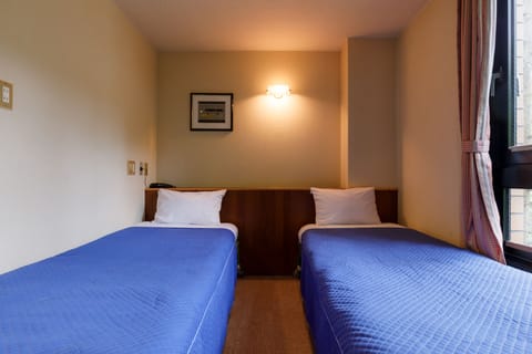 Twin Room, Non Smoking | Free WiFi, bed sheets