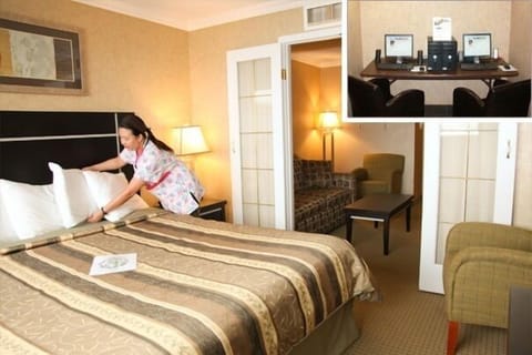 Deluxe Suite, 1 King Bed with Sofa bed | Living area | 32-inch flat-screen TV with cable channels, TV, foosball