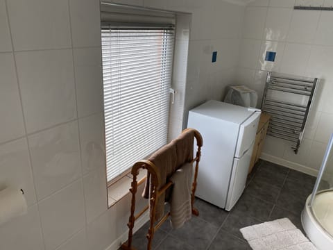 Large en-suite bathroom with tilt window