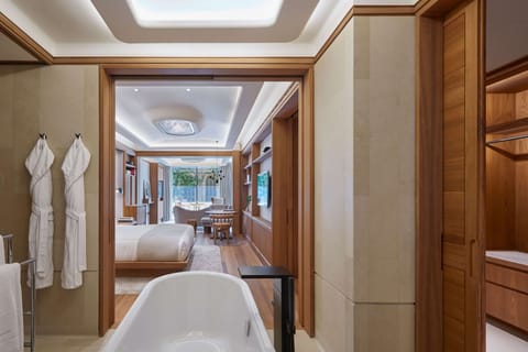 Terrace Junior Suite | Bathroom | Combined shower/tub, deep soaking tub, designer toiletries, hair dryer