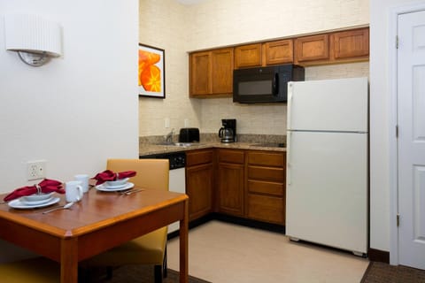 Suite, 1 Bedroom | Private kitchen | Full-size fridge, microwave, stovetop, coffee/tea maker