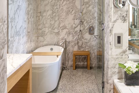 Junior Suite, 1 King Bed | Bathroom | Separate tub and shower, deep soaking tub, hydromassage showerhead