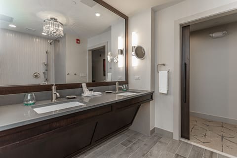 Luxury Street View Suite ADA | Bathroom | Shower, rainfall showerhead, designer toiletries, hair dryer