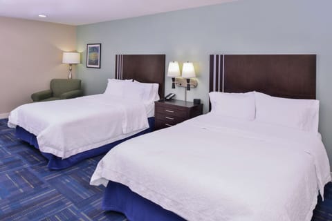 Blackout drapes, iron/ironing board, free cribs/infant beds