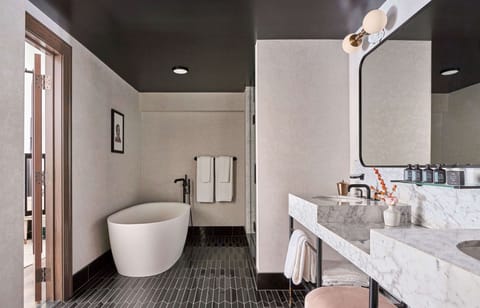 Suite, 1 King Bed (Loft) | Bathroom | Rainfall showerhead, designer toiletries, hair dryer, bathrobes