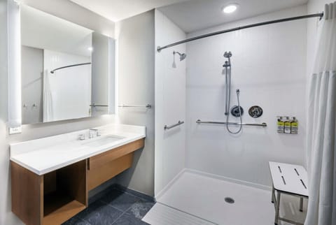 Suite, 1 Bedroom, Accessible, Kitchen (Mobility Roll-In Shower) | Bathroom | Combined shower/tub, towels