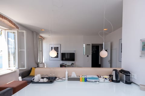 Junior Suite, Sea View | Private kitchenette | Full-size fridge, coffee/tea maker, electric kettle