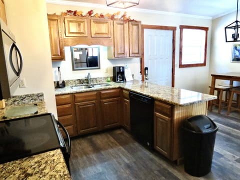 Mr. Coffee pot is there for your cup of Jo needs and a dishwasher for dishes.