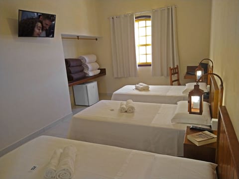 Comfort Triple Room, 3 Twin Beds | Minibar, individually furnished, desk, laptop workspace