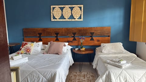 Family Triple Room | Hypo-allergenic bedding, minibar, free WiFi, bed sheets