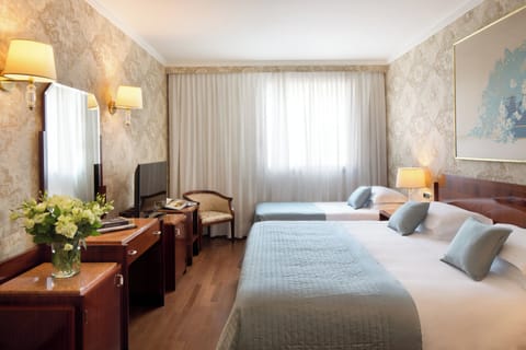 Triple Room | Premium bedding, minibar, in-room safe, individually decorated
