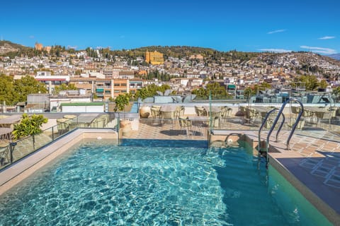 Seasonal outdoor pool, sun loungers