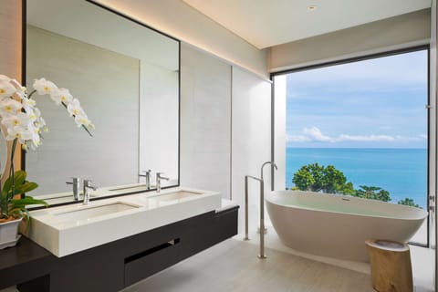 Suite, 1 Bedroom, Ocean View (Regency - Club Access) | Bathroom | Separate tub and shower, rainfall showerhead, hair dryer, bathrobes