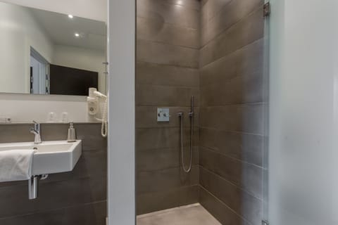 Eco-friendly toiletries, hair dryer, towels, soap