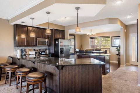 Full Kitchen with Additional Bar Seating