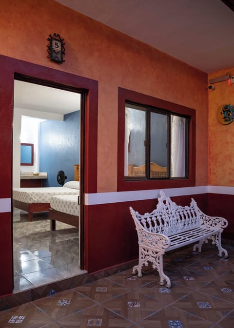 Basic Quadruple Room, 2 Queen Beds | Laptop workspace, free WiFi, bed sheets