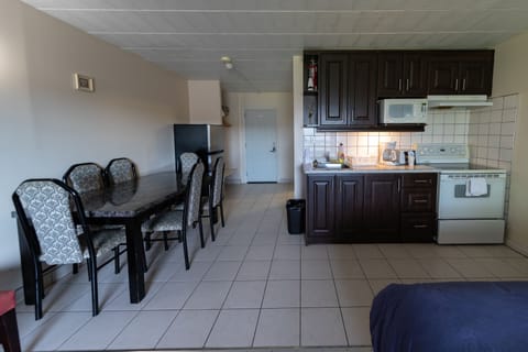 Family Room, Multiple Beds, Private Bathroom | Down comforters, individually furnished, desk, blackout drapes