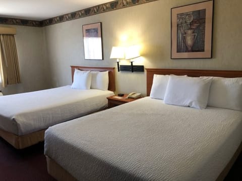 Standard Room, 2 Queen Beds | In-room safe, blackout drapes, iron/ironing board, free WiFi