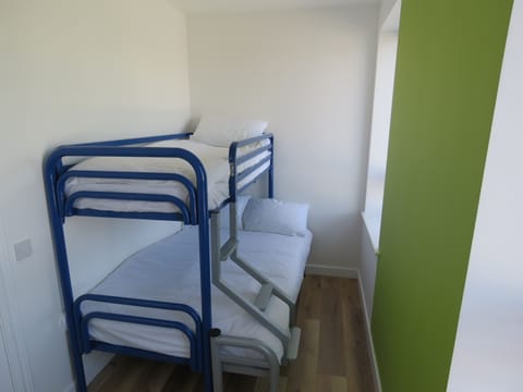 Standard Triple Room | Blackout drapes, iron/ironing board, free WiFi, bed sheets