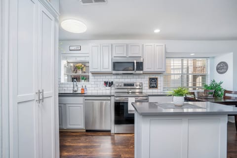 Feel right at home in your warm and welcoming kitchen, complete with all the amenities you need to cook and enjoy delicious meals during your stay.