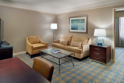 Executive Suite, 1 King Bed with Sofa bed | Living room | 42-inch LED TV with cable channels, TV, iPod dock