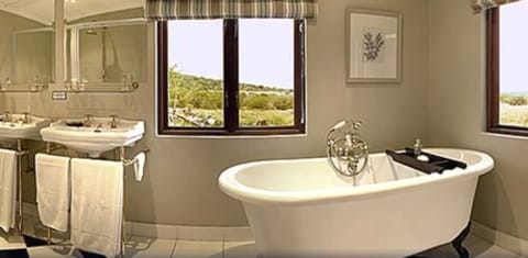 Long Hope Villa  | Bathroom | Separate tub and shower, deep soaking tub, free toiletries, hair dryer