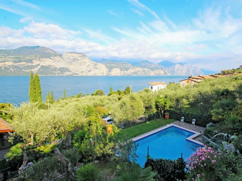 Cloud, Water, Sky, Property, Plant, Nature, Azure, Mountain, Swimming Pool, Building