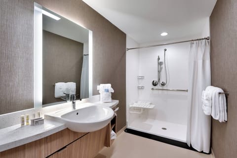 Suite, 2 Queen Beds, Non Smoking | Bathroom | Combined shower/tub, hair dryer, towels, soap