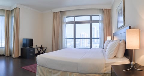 Standard Suite, 2 Bedrooms (1 King, 2 Single) | In-room safe, soundproofing, iron/ironing board, free WiFi
