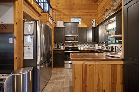 All cooking equipment, dishes, small appliances, and utensils are stocked.