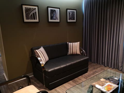 Presidential Studio Suite | In-room safe, laptop workspace, blackout drapes, iron/ironing board