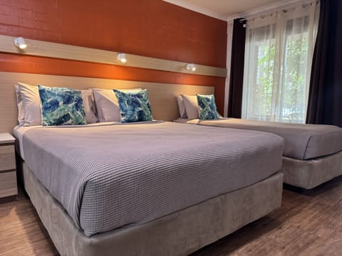 Deluxe Queen Room | In-room safe, individually decorated, individually furnished, desk