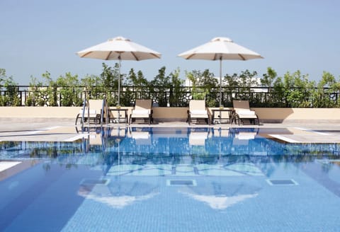 Outdoor pool, open 8:00 AM to 8:00 PM, sun loungers