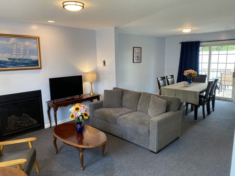 Luxury Room | Living area | 32-inch TV with cable channels