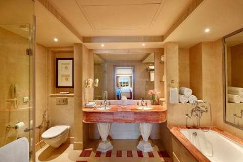 Deluxe Suite, 1 Bedroom | Bathroom | Separate tub and shower, hydromassage showerhead, free toiletries